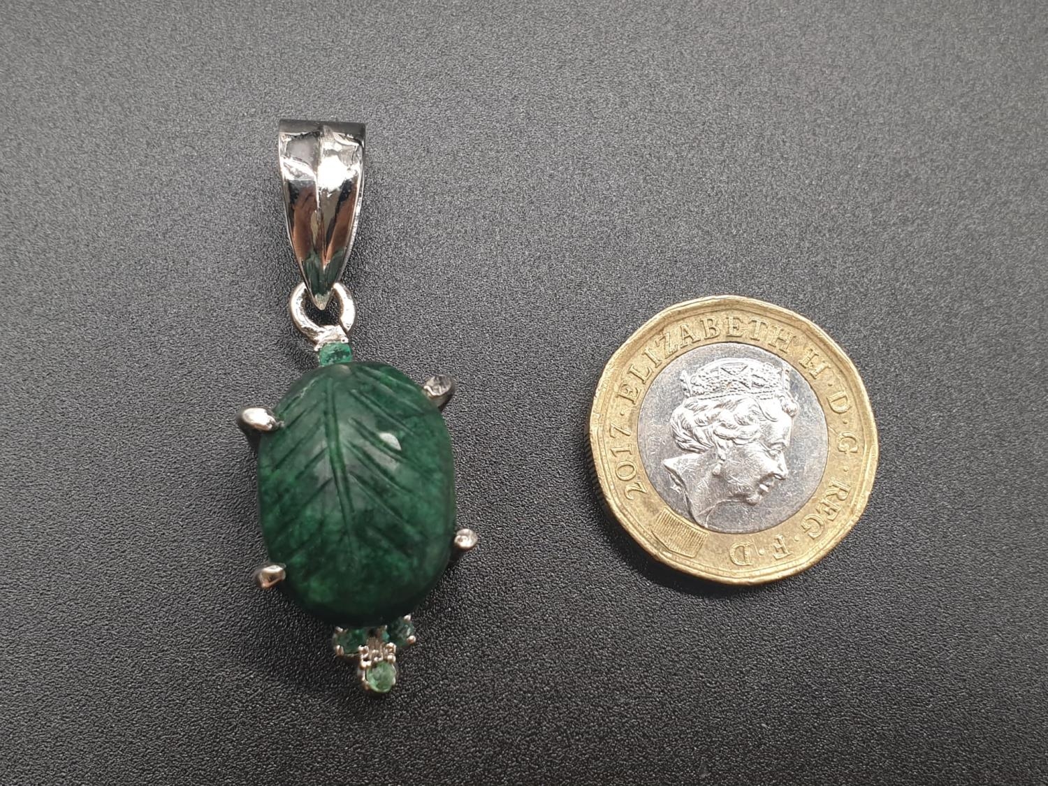 Carved Emerald Oval Pendant set In Sterling Silver, weight 10.65g and 5cm drop approx - Image 3 of 4