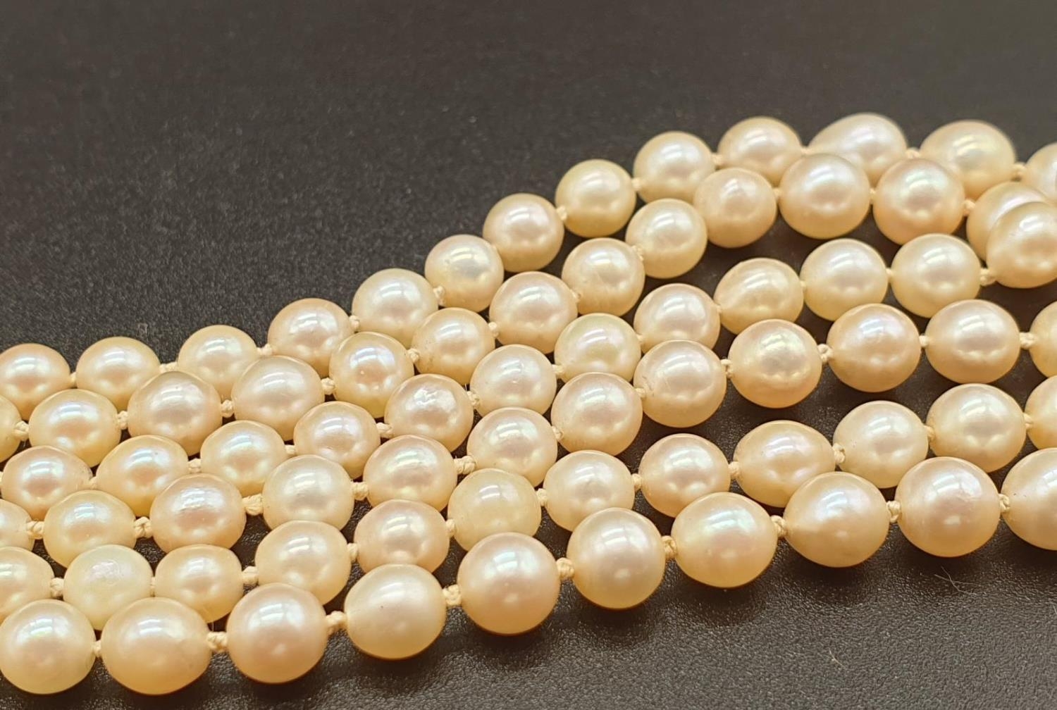 A 3 ROW GRADUATED PEARL NECKLACE WITH PLATINUM AND DIAMOND CLASP 48gms and 18cms in length - Image 6 of 6