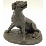 A BRONZE FIGURE OF A SITTING DOG. 767gms 14cms tall.