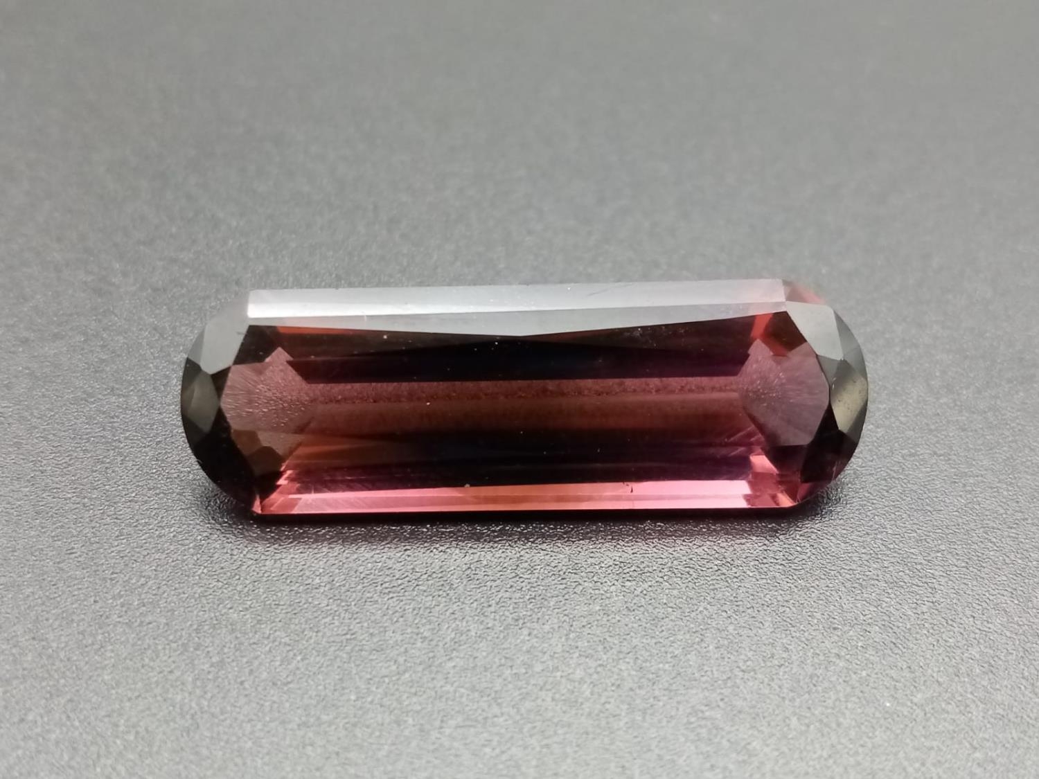 A large pencil cut pink tourmaline 28.5x9.5mm total carats 14.35