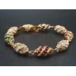 A highly glamorous bracelet consisting of miniature Faberge style eggs. This is an exact and