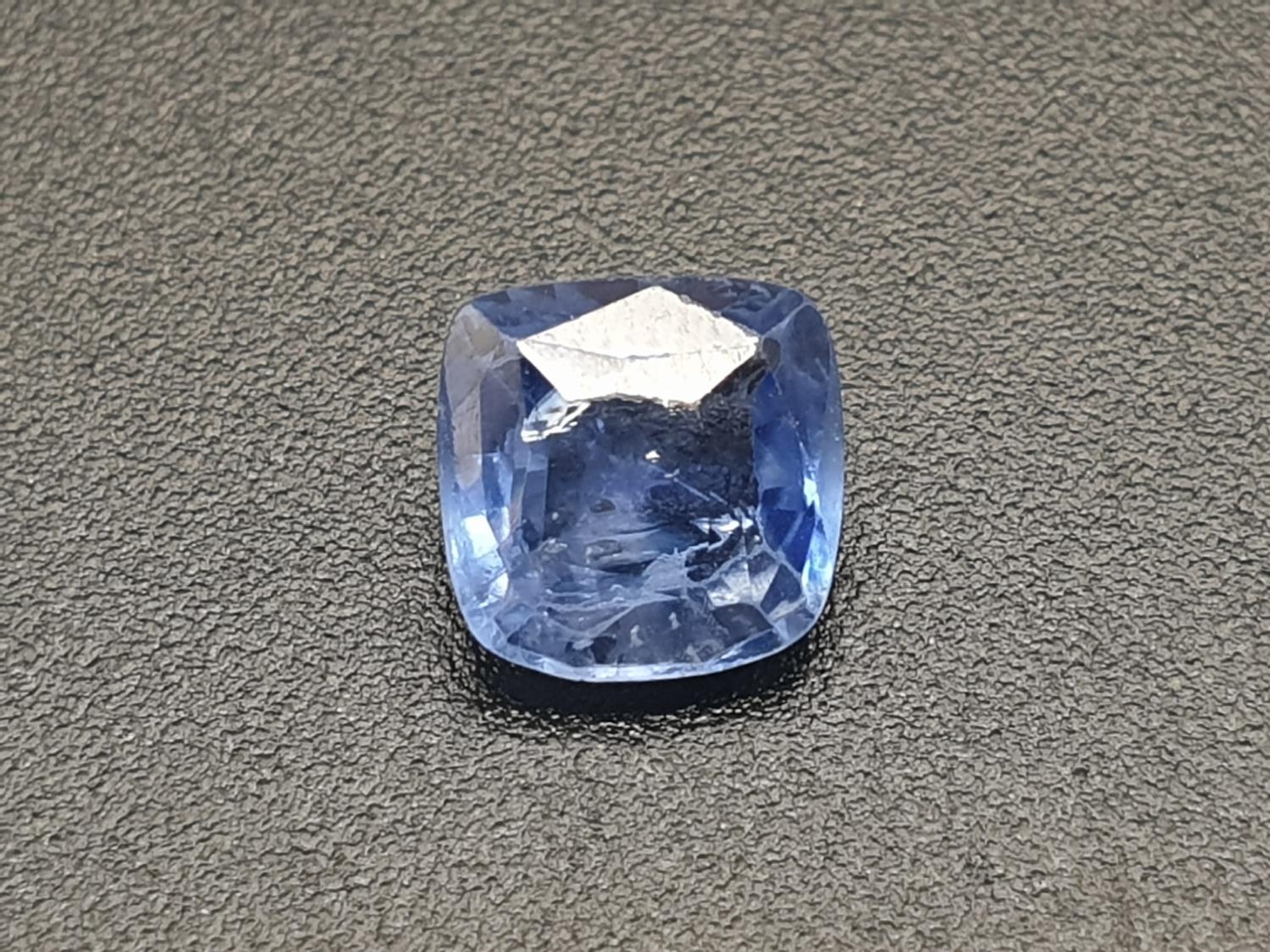 1.25ct cushion cut blue sapphire gemstone comes with original AnchorCert report and Safeguard