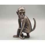 Rare Russian solid silver monkey table oil lighter with diamond eyes. 348.5gms 10.5cms tall