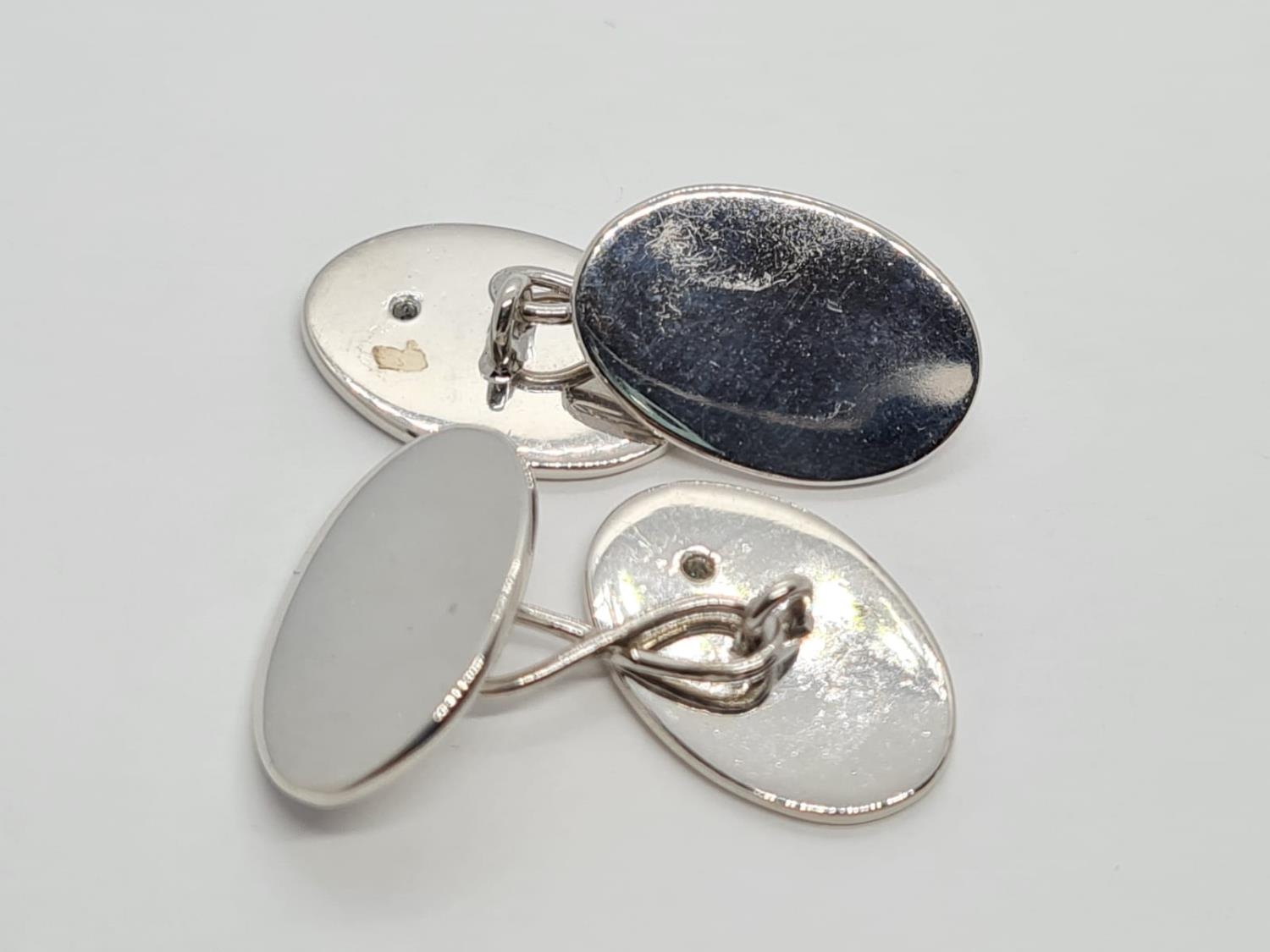 a pair of 18k white gold cuff links with a set diamond . 15.7gms - Image 2 of 9