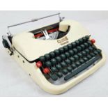 Vintage Oliver Courier Portable Typewriter. In working order with original carry case. Good