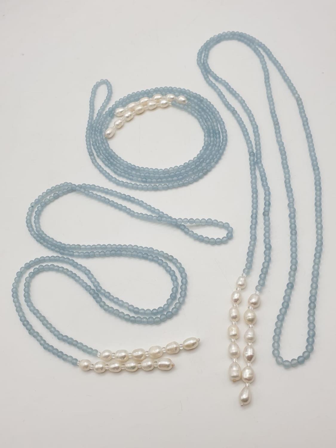 Three very long rows (128cm!) of aquamarine (colour enhanced) and natural pearls that can form a - Image 6 of 10