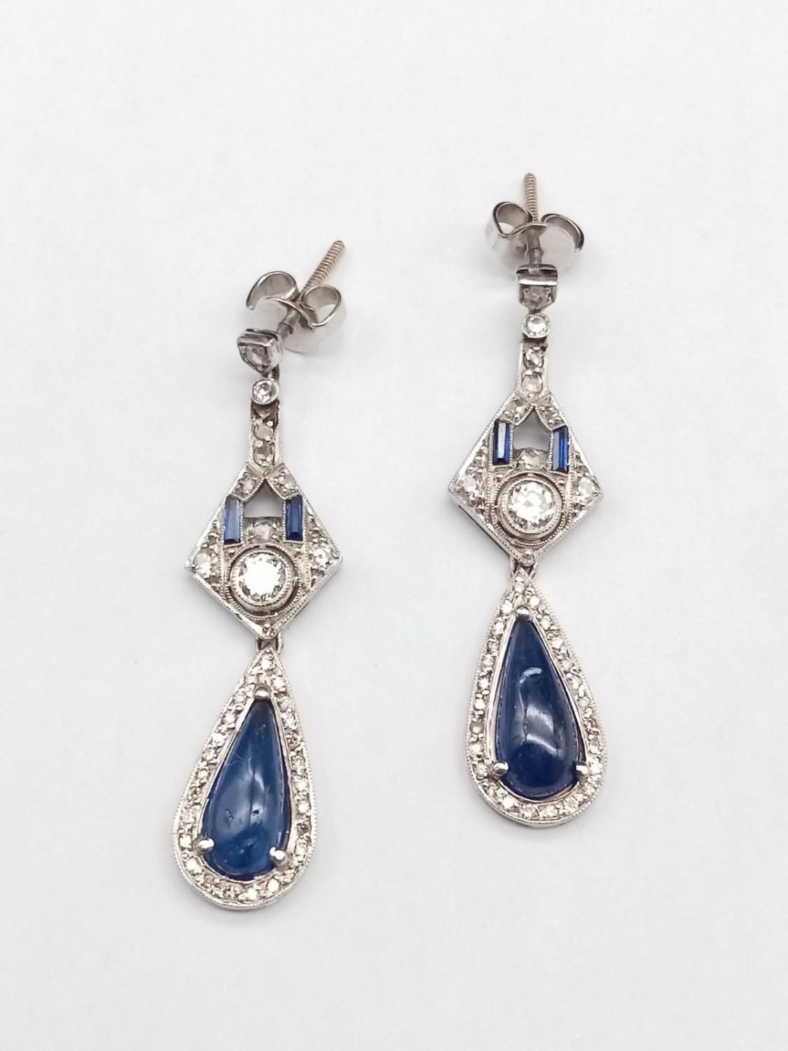 A PAIR OF SAPPHIRE AND DIAMOND EARRINGS IN CLASSIC ART DECO STYLE. 6.5gms 4cms DROP