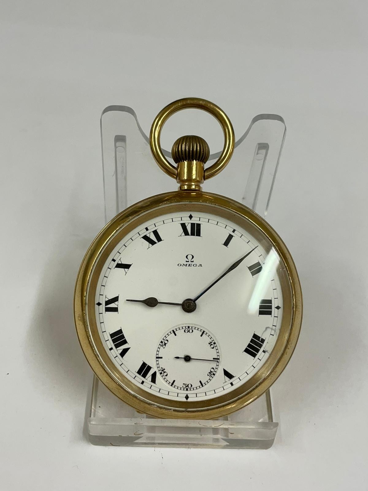 Vintage yellow metal omega pocket watch working but sold with no guarantees