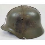 WW2 German M40 Helmet. Stamped Q-64 for the Quiest Factory in Esslingen. Alas the double decals have