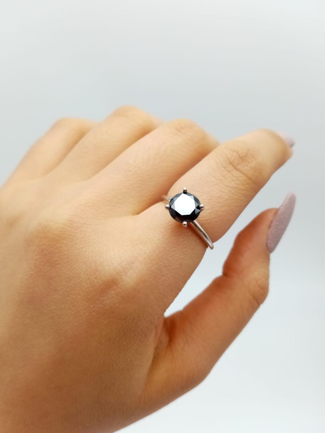 Black diamond solitaire ring set in 14k white gold, weight 2.5g and size K1/2 - Image 4 of 6