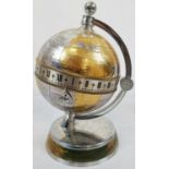 A Mappin and Webb Greenwich Meridian Globe Clock Timepiece. Silver Plate and gilt decoration on an