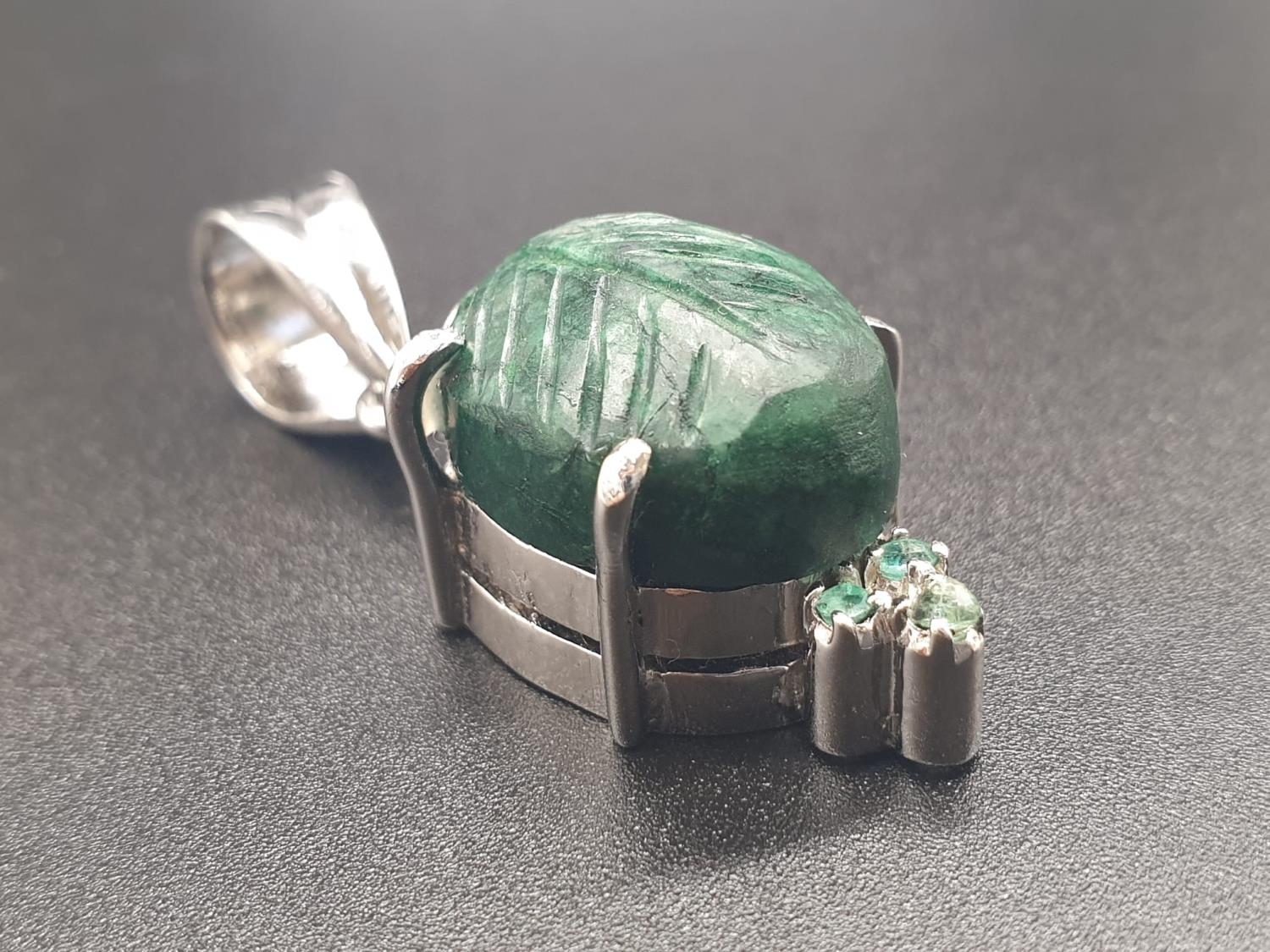 Carved Emerald Oval Pendant set In Sterling Silver, weight 10.65g and 5cm drop approx - Image 2 of 4