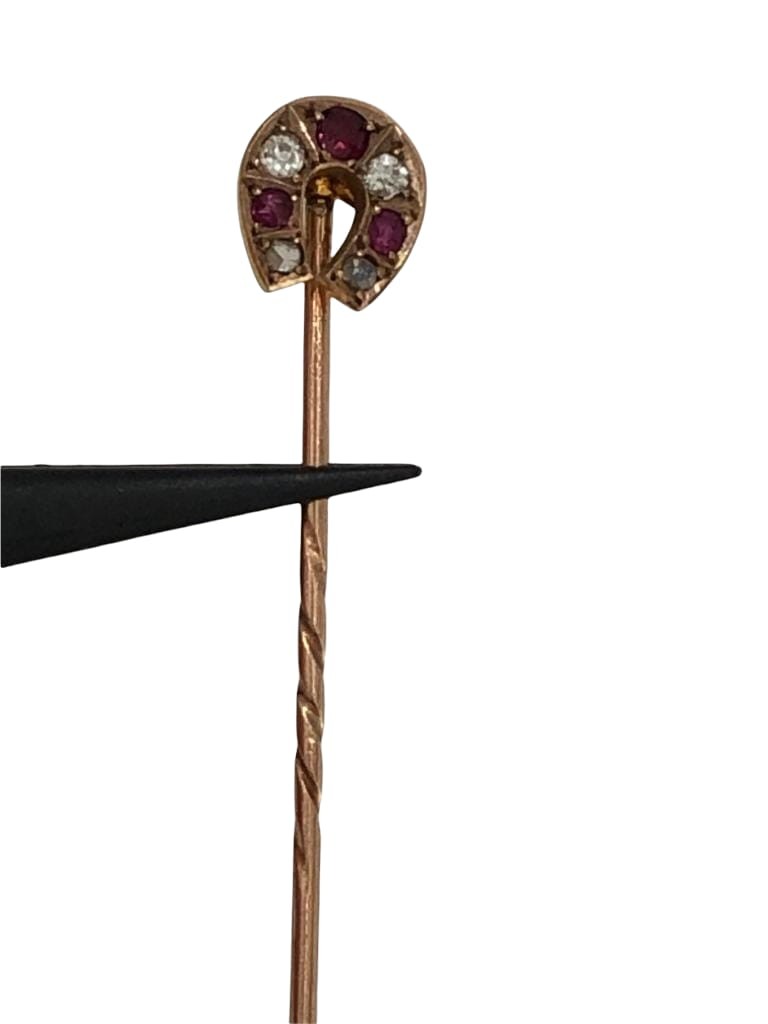 Antique gold pin with diamonds and rubies; 2g;