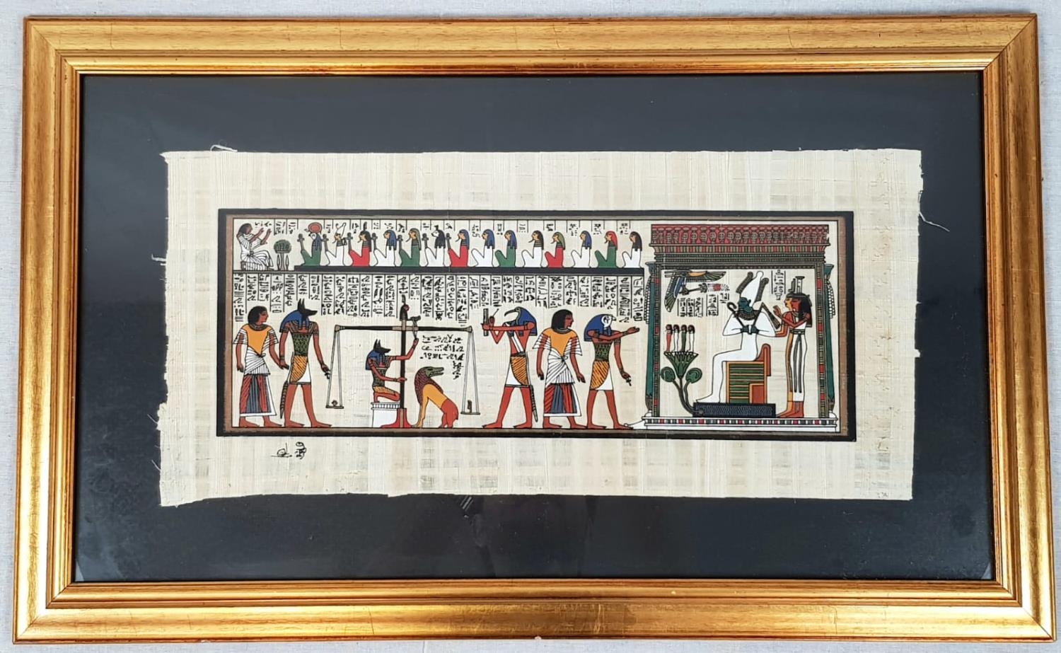 An Egyptian Painting on Papyrus. Signed by the Artist. Gilded Frame. 68 x 41cm.