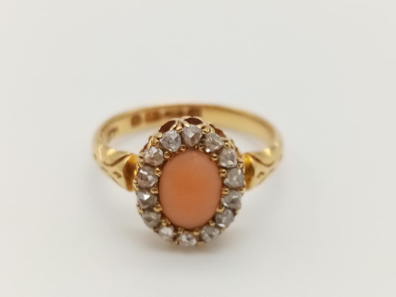 Georgian 18k yellow gold antique ring with coral centre and decorated with rose cut diamonds