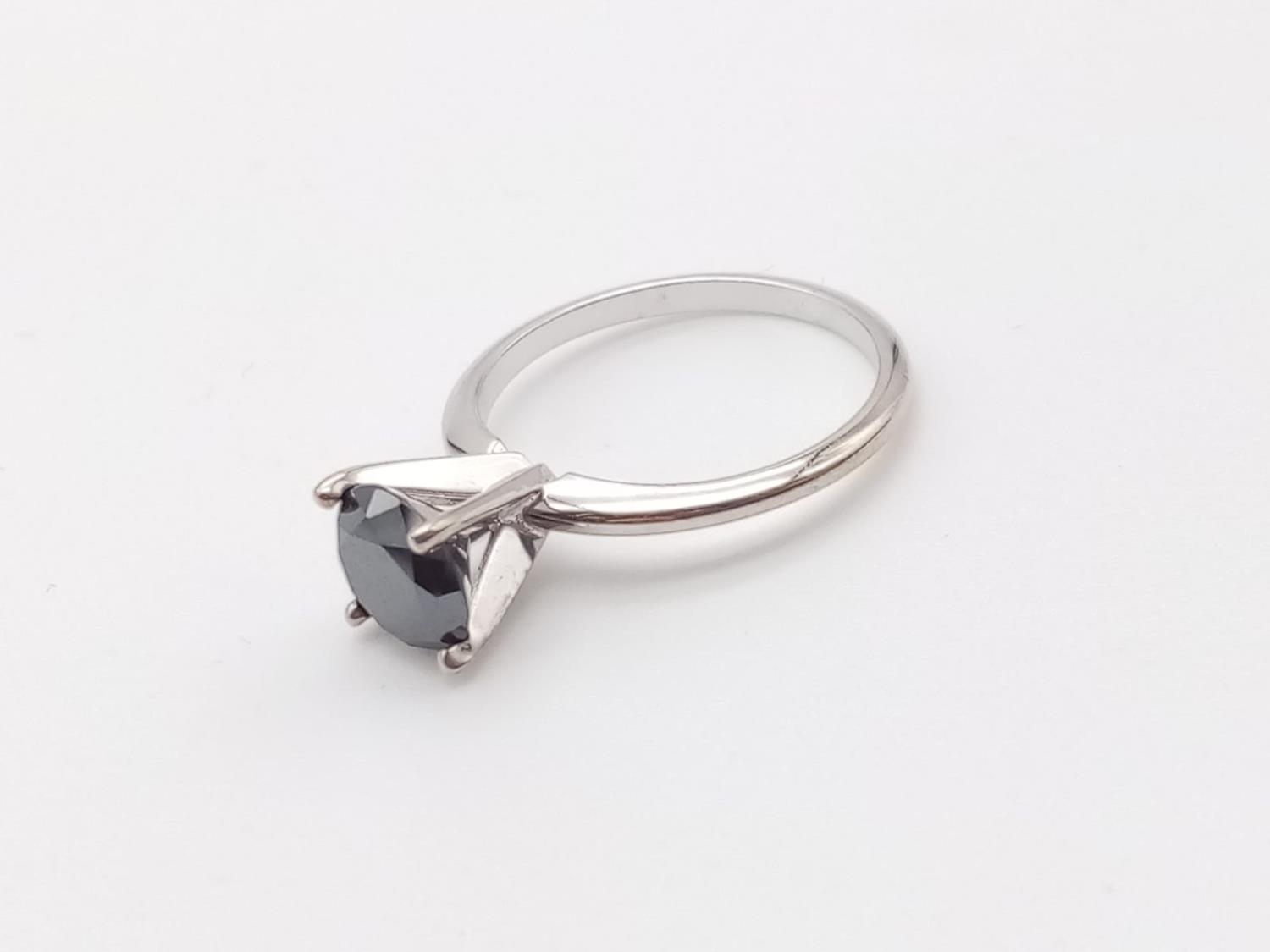 Black diamond solitaire ring set in 14k white gold, weight 2.5g and size K1/2 - Image 2 of 6