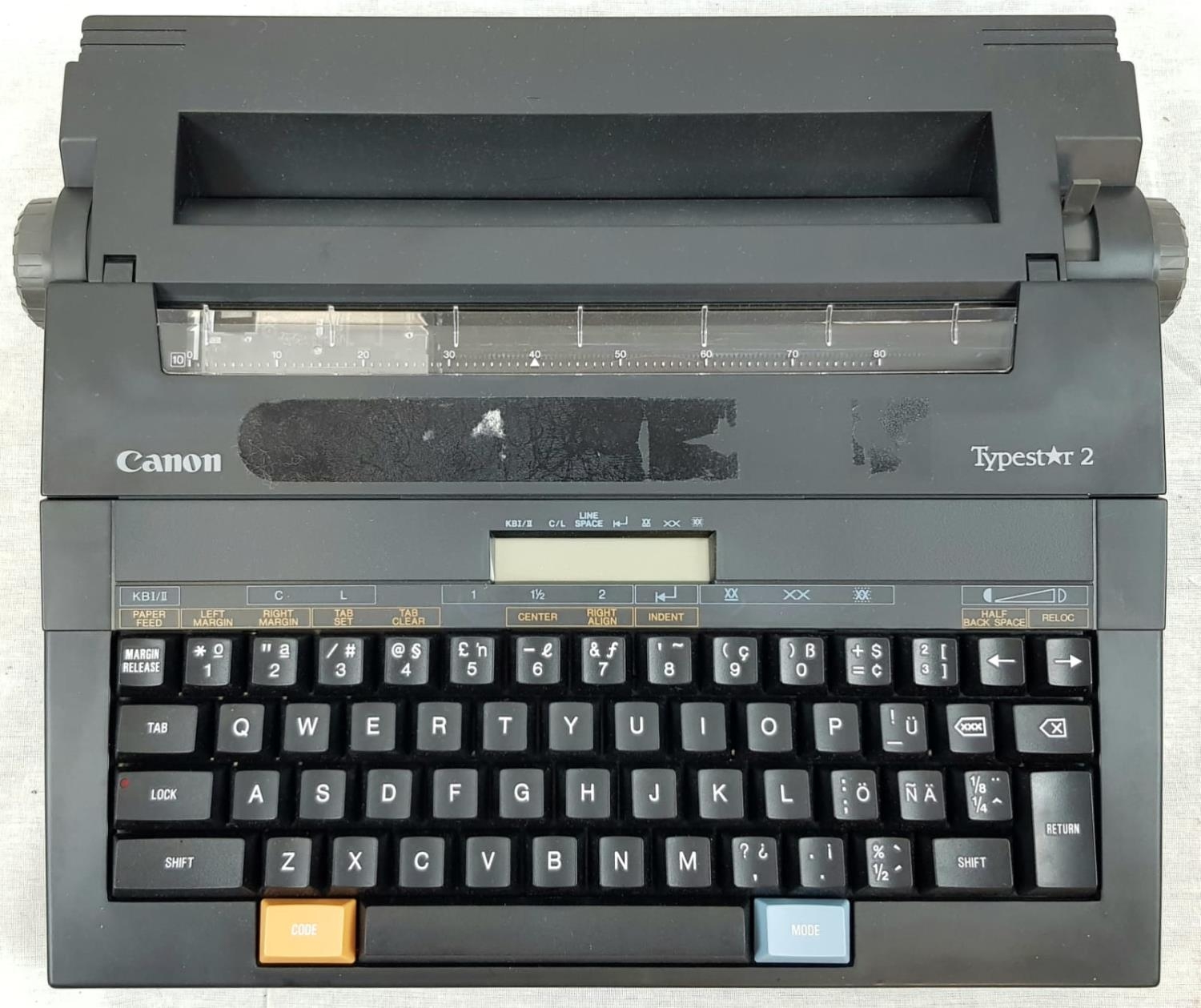 Canon Typestar 2 Portable Electronic Typewriter. Go back in time with this vintage word processor.