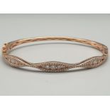 14k rose gold diamond bangle with approx 1.50ct brilliant diamonds, weight 11.8g and 6.5cm inner