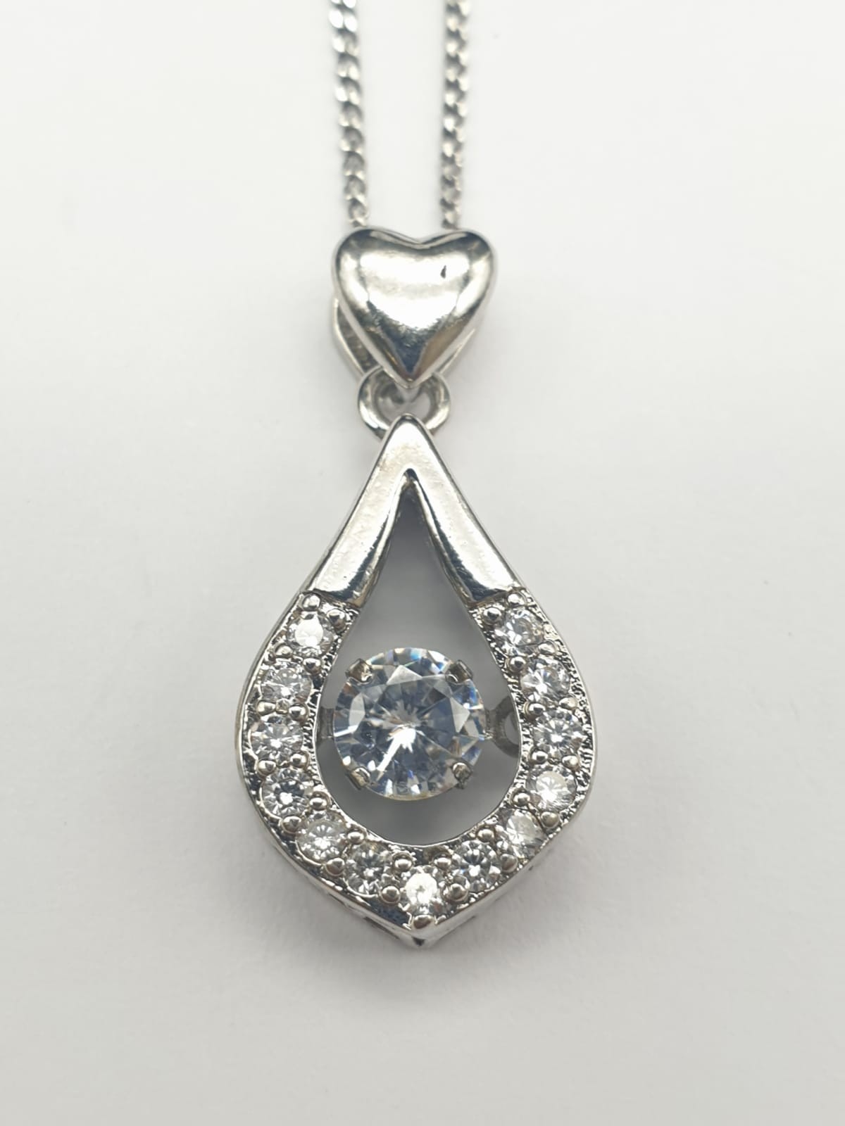 Sterling silver Stone Set Heart and Pearl Shape Pendant Necklace. 18 inches in presentation box.