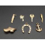 Seven - 9k Yellow Gold Charms. 2.26g total weight.
