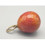 20th century Russian 14k gold enamel egg pendant (orange marble effect0 8.4gms 2cm drop.