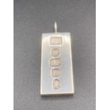 Vintage SILVER INGOT pendant .1977 Hallmark , having 4.5 cm drop.