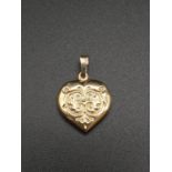 9k Yellow Gold Heart Pendant. .59g