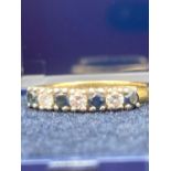 18 carat gold diamond and sapphire ring having full London gold hallmark .2.5 grams . Size J 1/2 .