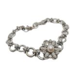 18k white gold French antique diamond and pearl set bracelet, flower design, weight 18.5g approx 2ct