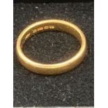 22 carat gold band, having full UK hallmark. 5.8 grams . Size N.