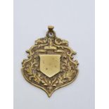 Watch FOB marked as 18ct Gold. circa 1890. 13.1g 4.5x 3.5cm