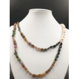 389cts Pearl and multigemstone necklace 57cm