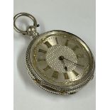 Vintage silver pocket watch , ticks when shaken , no key .