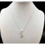 Sterling silver wave style pendant necklace on sterling silver chain in presentation box