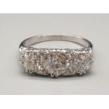 Platinum diamond trilogy ring with approx 1.80ct diamonds in total, weight 4.2g and size M