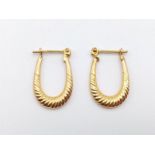 Pair of 9K Yellow Gold Horseshoe Earrings. 1.25g