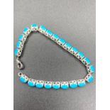 Silver TENNIS BRACELET With articulated Turquoise coloured stones ,18 cm approx ,excellent condition