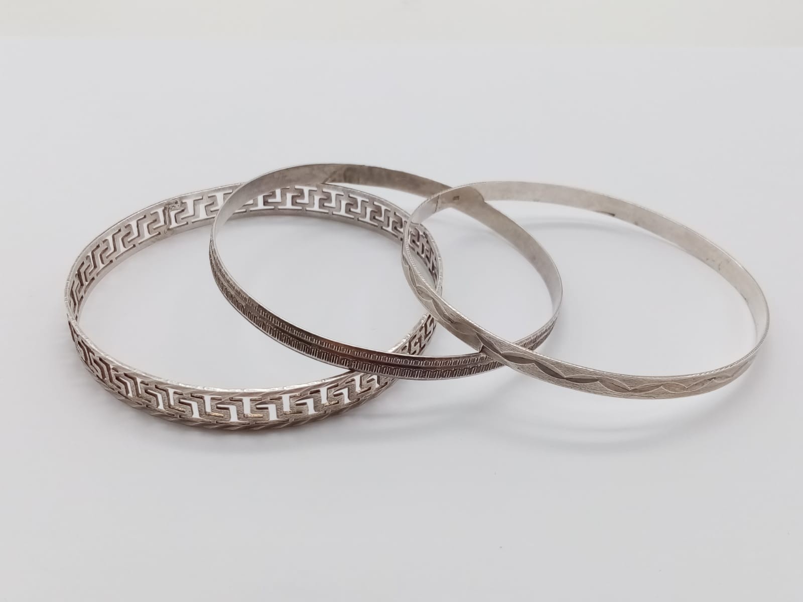 Three Silver Bangles. Different Thicknesses and decorations. 21.39g total weight. 6.5cm diameter. - Image 3 of 5