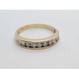 9K YELLOW GOLD DIAMOND SET HELF ETERNITY RING WITH 0.45CT DIAMONDS AND WEIGHT 3.1G SIZE U