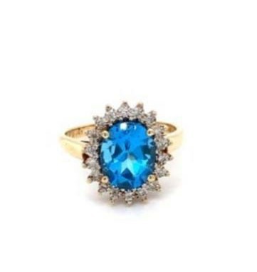 14k yellow gold ring set with large blue Topaz centre and surrounded by brilliant diamonds, weight - Image 2 of 2