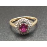 18k Yellow Gold Ruby and Diamond Cluster Ring. 2.8g total weight.