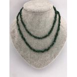 necklace set in tumbled emeralds with brass clasp; 33.20g; 36inches approximately
