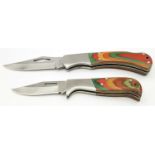 Two quality colour grained hardwood lock knives. 12 cm and 9cm.