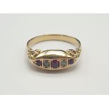 18K Yellow Gold and Diamond Ruby Five Stone Ring. 4.3g. Size P.