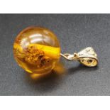 Amber Pendant Encompassing a Trapped Bee.