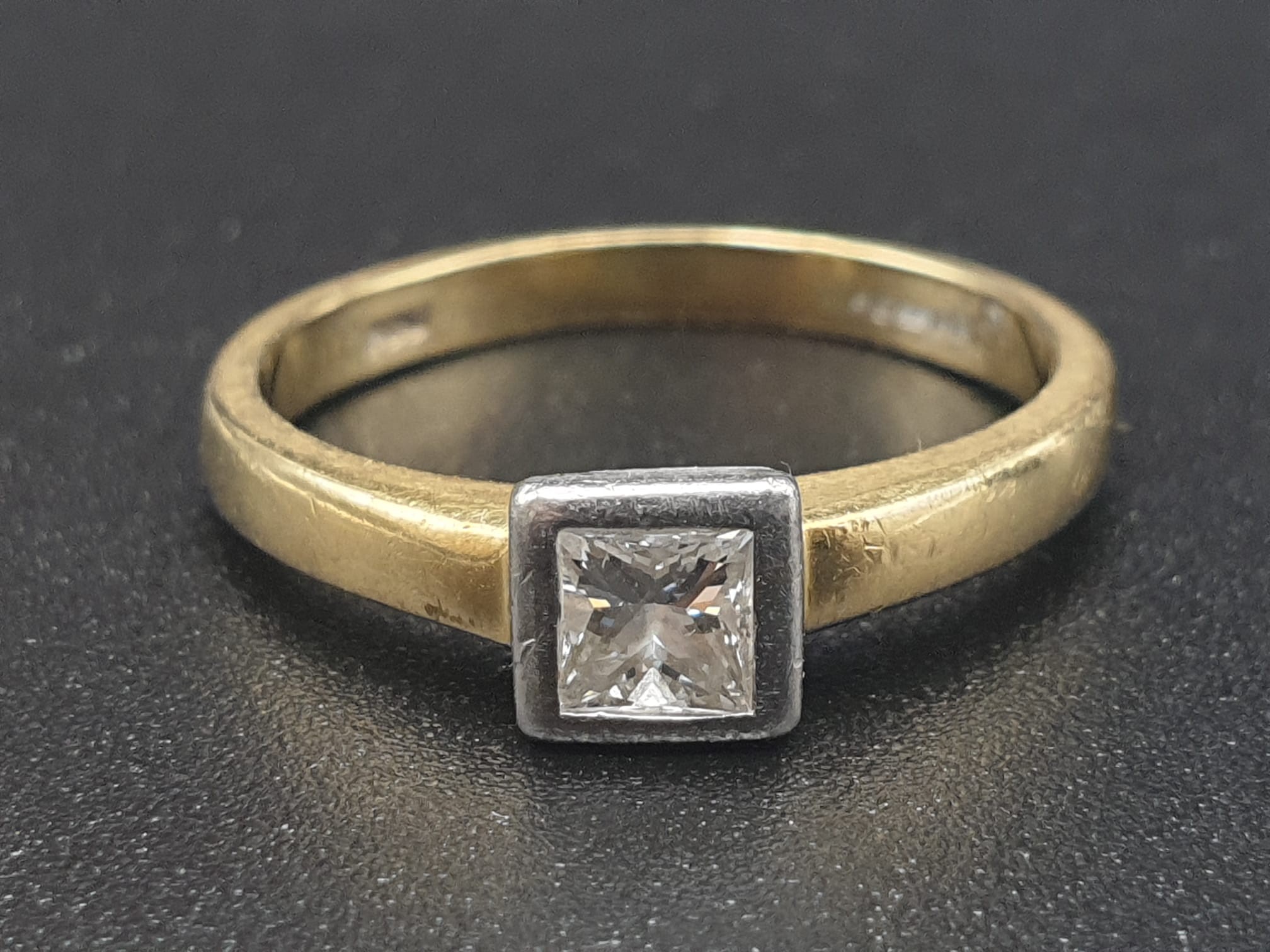 18k Yellow Gold Diamond Ladies Ring. Size J. 3.11g. Princess cut diamond. Original heart-shaped box.