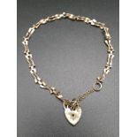9K yellow Gold Link Bracelet with Heart Charm. 20cm. 2.87g