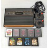 Atari 2600 Games Console with Nine Games. Comes with Two Joysticks, and all other necessary