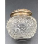 Silver topped cut glass Rouge pot having clear hallmark for Levi and Salaman Birmingham 1904.