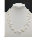 Pearl Necklace/Choker with a 14k Yellow Gold Clasp. 10.46g total weight. 20cm